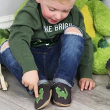 Niño con zapatos de piel de suela blanda con diseño de dinosaurio - Dotty Fish